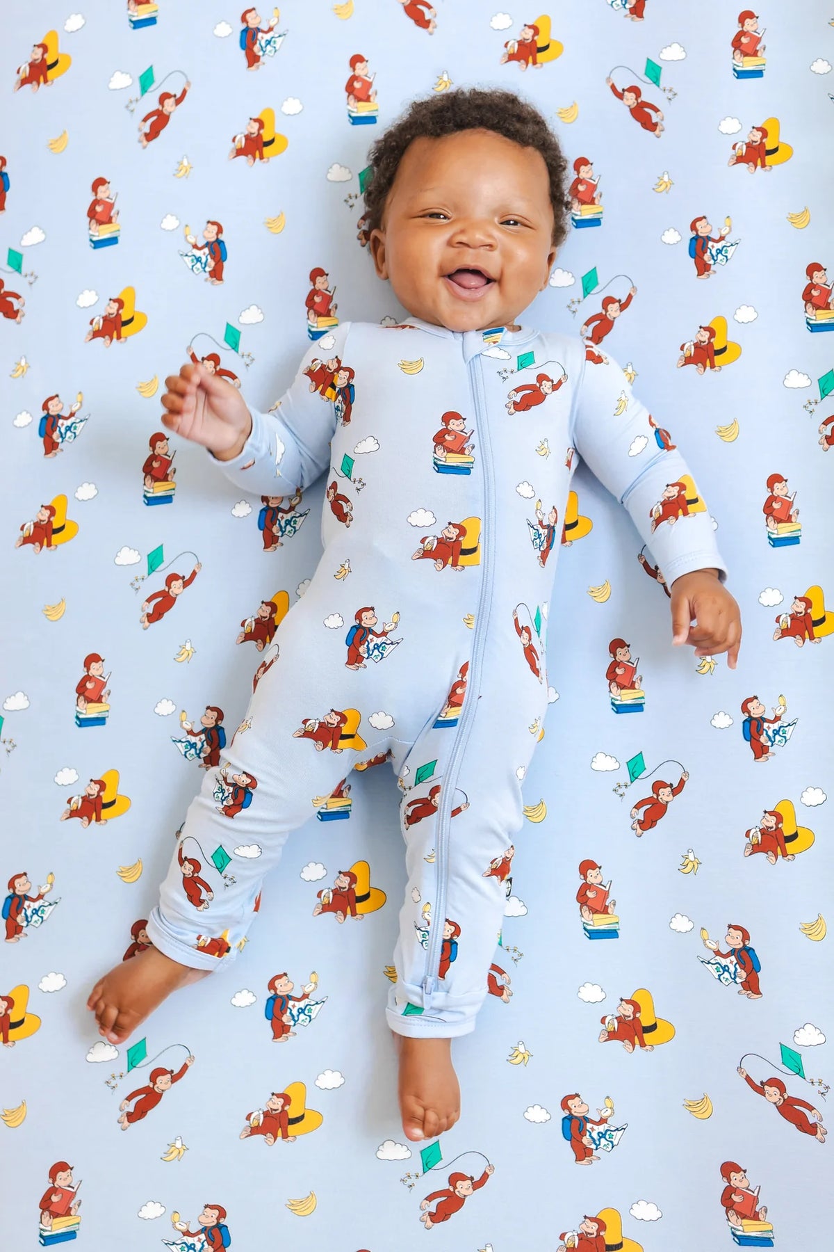 Kyte Baby Zippered Romper in Curious George