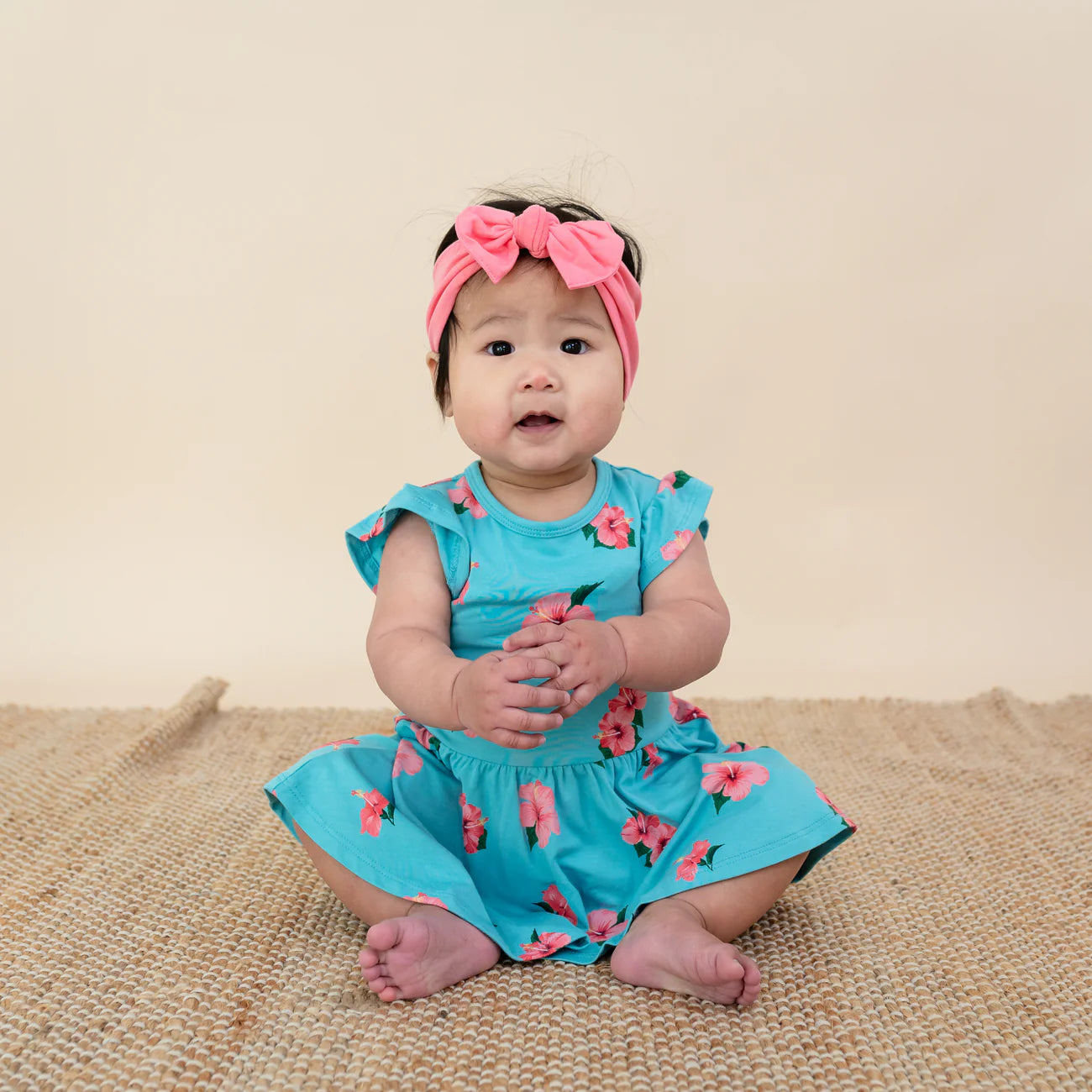 Kyte Baby Twirl Bodysuit Dress in Hibiscus
