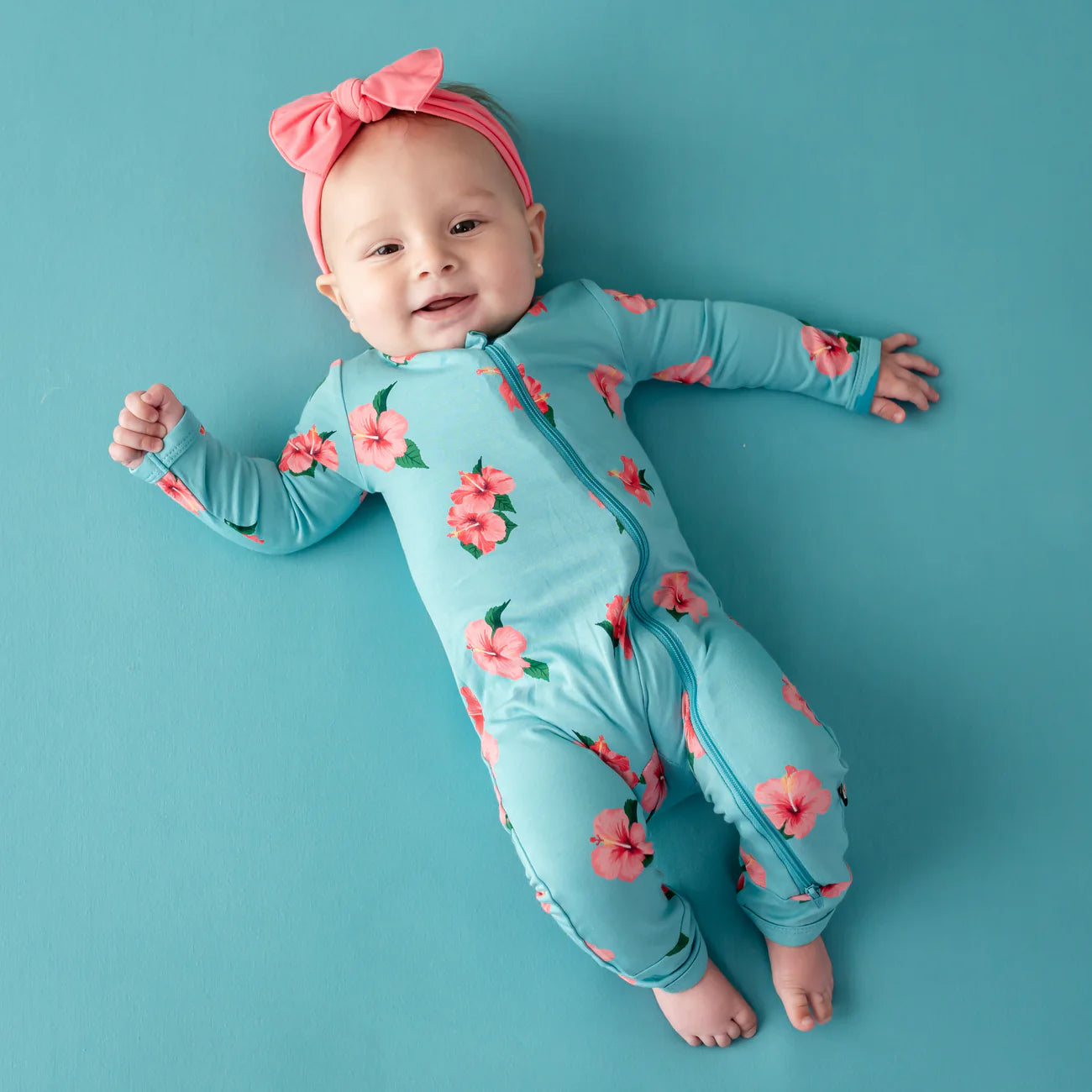 Kyte Baby Zippered Romper in Hibiscus