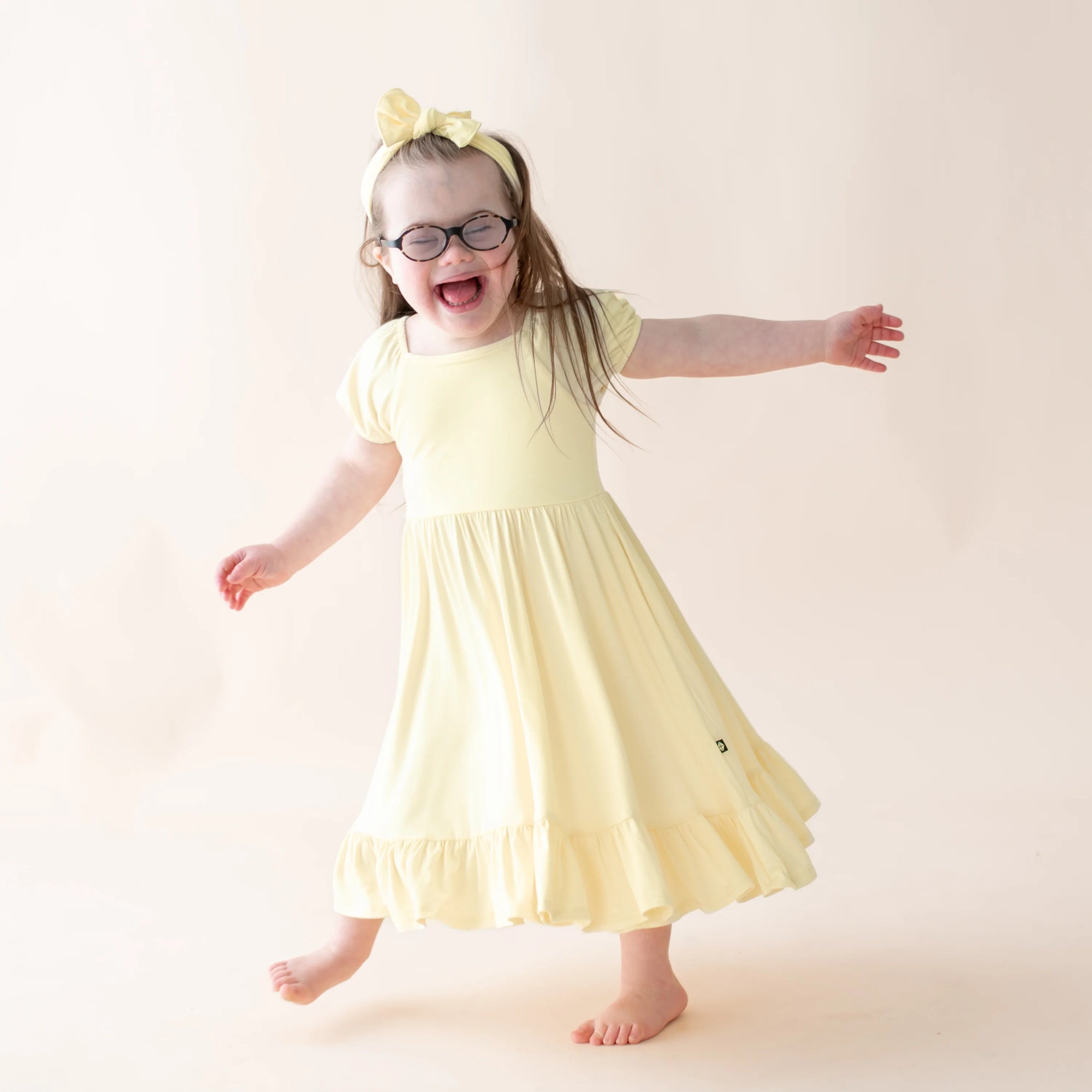 Kyte Baby Puff Sleeve Twirl Dress in Chamomile