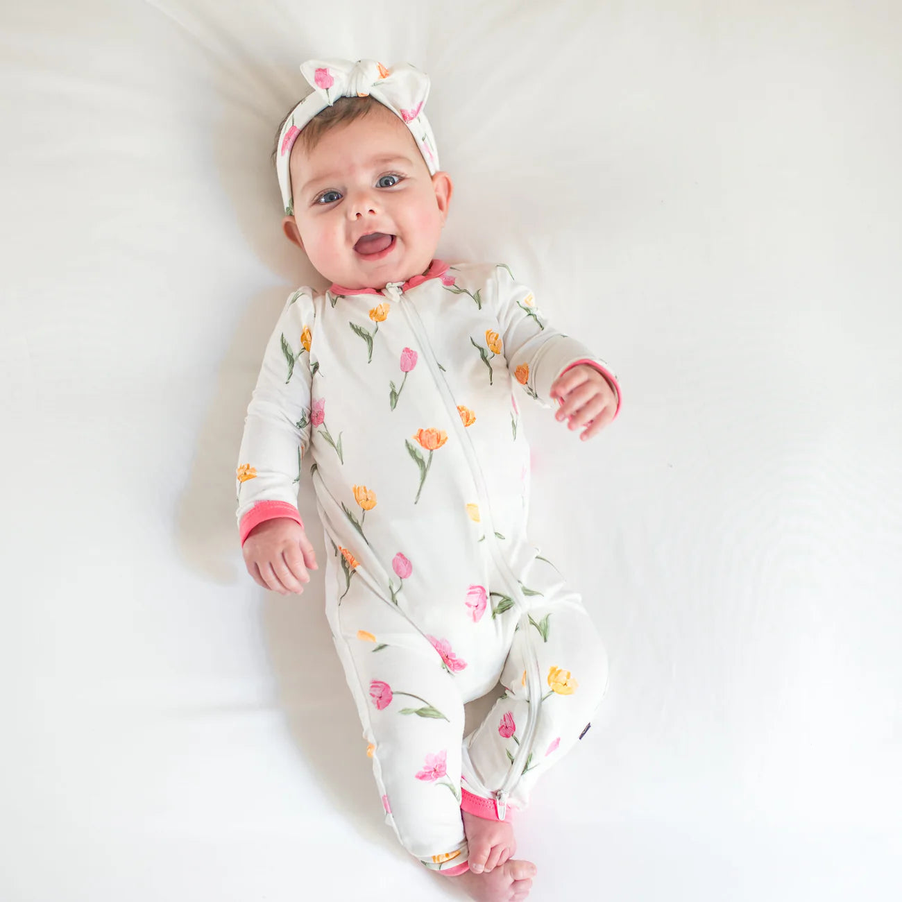 Kyte Baby Zippered Romper in Tulip